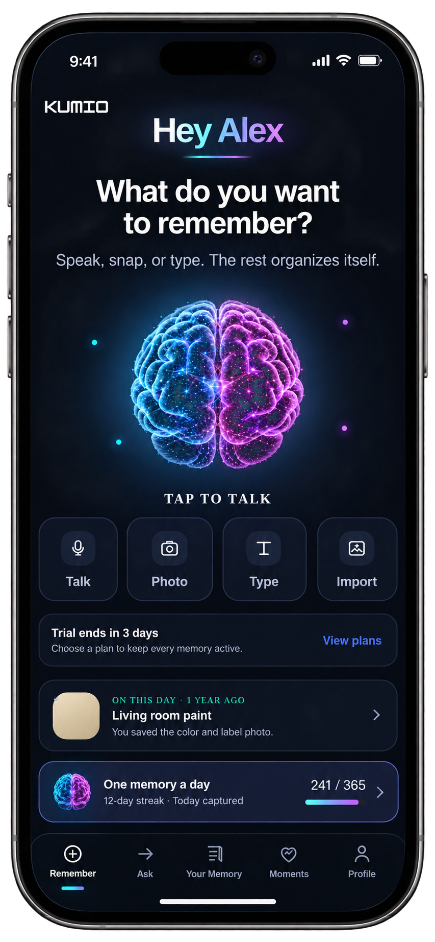 KUMIO home screen on iPhone with the particle brain, capture options, reminders, memory cards, and navigation